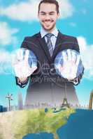 Composite image of happy businessman presenting his hands