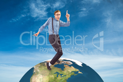 Composite image of geeky hipster dancing to vinyl