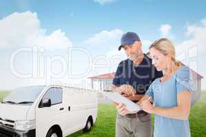 Composite image of happy blonde signing for a delivery