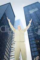 Composite image of excited delivery man with arms raised looking