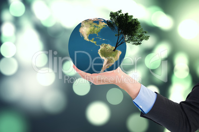 Composite image of close up of businessman with empty hand open