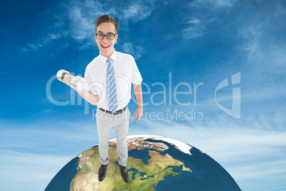 Composite image of geeky happy businessman lifting dumbbell