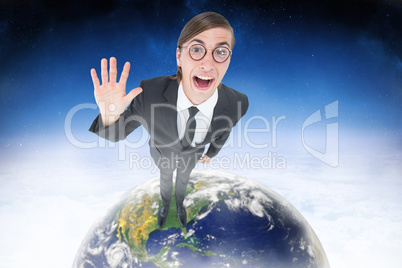 Composite image of geeky businessman waving at camera