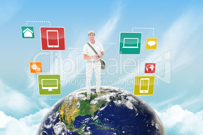 Composite image of happy delivery man using digital tablet