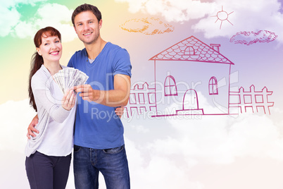 Composite image of couple holding fan of cash