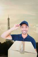 Composite image of happy delivery man wearing cap while holding