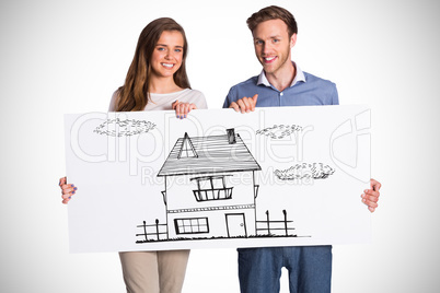 Composite image of happy young couple with blank board