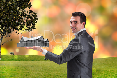 Composite image of businessman presenting with hand