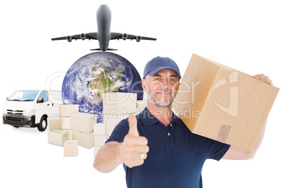 Composite image of happy delivery man holding cardboard box show