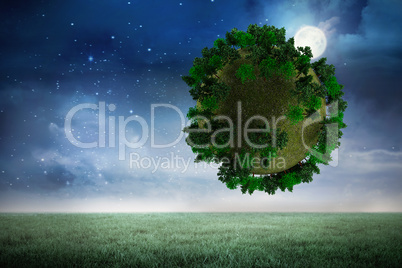 Composite image of sphere covered with forest