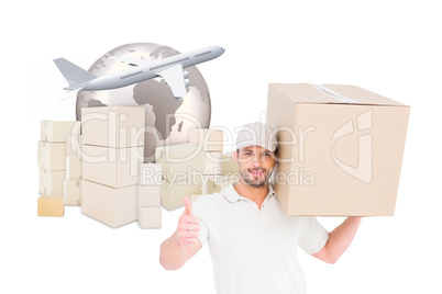 Composite image of delivery man with cardboard box gesturing thu