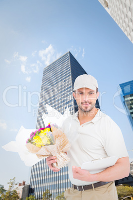 Composite image of flower delivery man showing clipboard