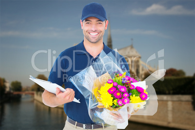 Composite image of happy flower delivery man holding clipboard