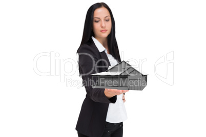 Composite image of pretty businesswoman presenting with hand