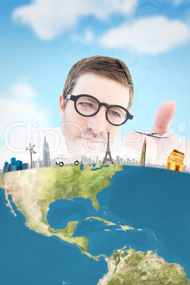 Composite image of businessman pointing with his finger