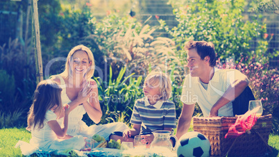 Happy family having a picnic