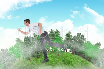 Composite image of geeky businessman running late