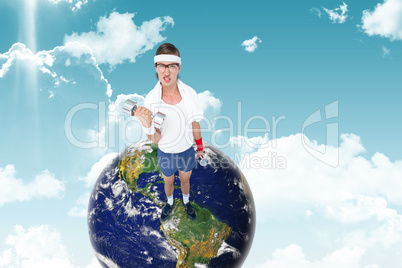 Composite image of geeky hipster lifting dumbbells in sportswear