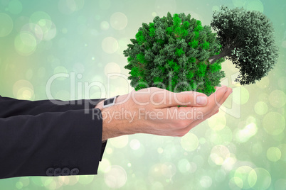 Composite image of businessman with arms out presenting somethin