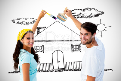 Composite image of happy young couple painting together