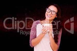 Composite image of brunette with mug