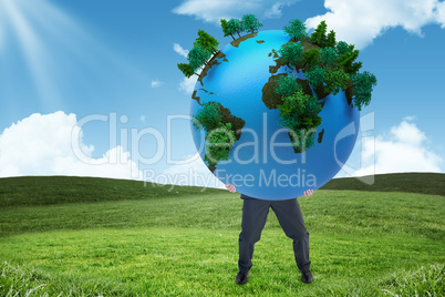 Composite image of businessman carrying the world