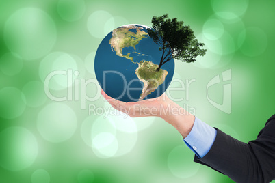 Composite image of close up of businessman with empty hand open