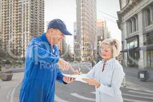 Composite image of happy delivery man with customer