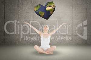 Composite image of toned young woman sitting with arms outstretc