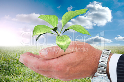 Composite image of businessman in suit offering handshake