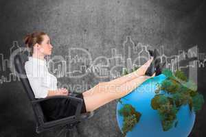 Composite image of businesswoman sitting on swivel chair with fe