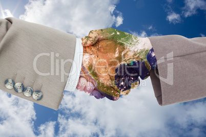 Composite image of side view of business peoples hands shaking