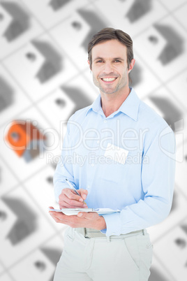 Composite image of portrait of confident supervisor writing note