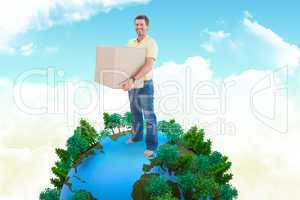 Composite image of man holding moving boxes