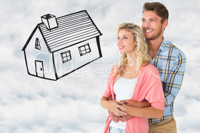 Composite image of attractive young couple embracing and smiling