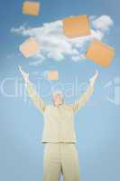 Composite image of excited delivery man with arms raised looking