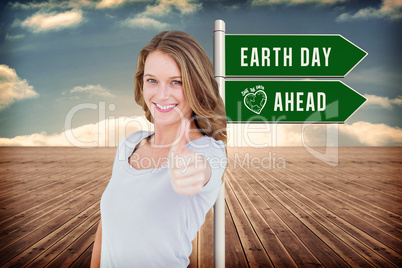 Composite image of smiling woman