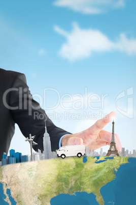 Composite image of businessman hand pointing something