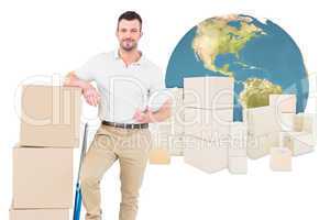Composite image of confident delivery man with cardboard boxes