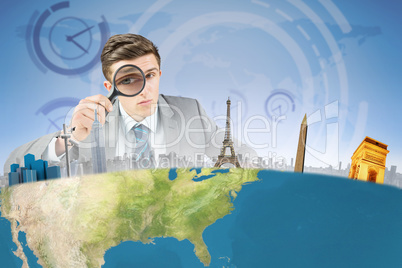 Composite image of businessman with magnifying glass