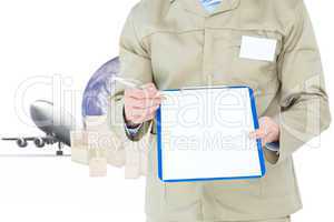 Composite image of delivery man showing blank paper on clipboard