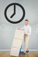 Composite image of happy delivery man with trolley of boxes
