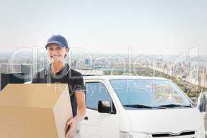 Composite image of happy delivery woman holding cardboard box