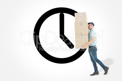 Composite image of delivery man carrying cardboard boxes