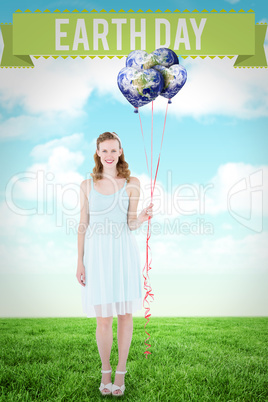 Composite image of happy hipster woman holding balloons