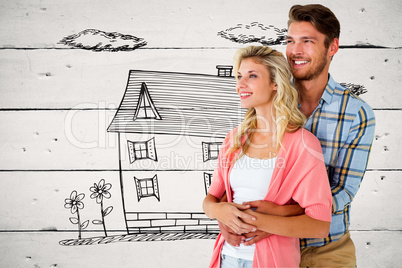 Composite image of attractive young couple embracing and smiling