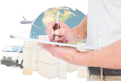 Composite image of delivery man writing on clipboard