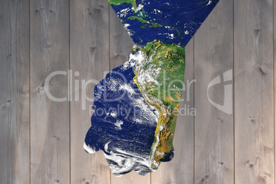 Composite image of hipster couple standing hand in hand Composite image of hipster couple standing hand in hand