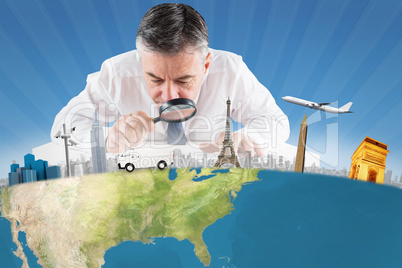 Composite image of mature businessman examining with magnifying