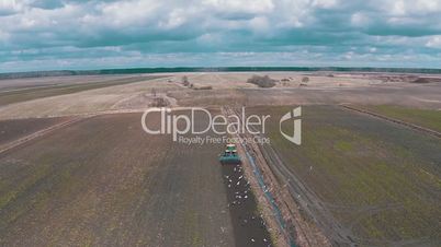 Tractor Plowing the Field, aerial shot